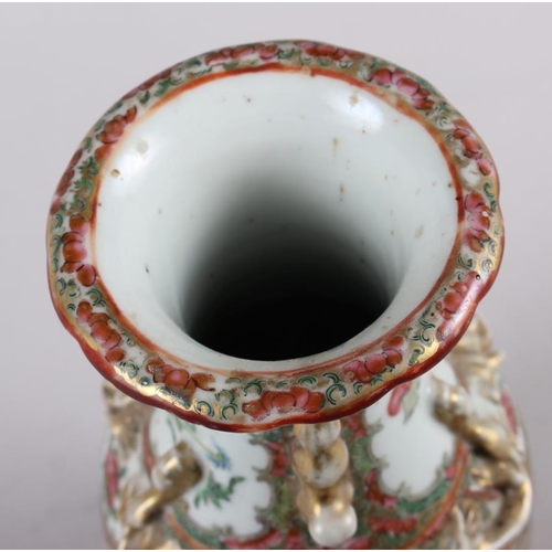 59 - A Canton enamel two-handled baluster vase with gilt decoration, 9 1/2