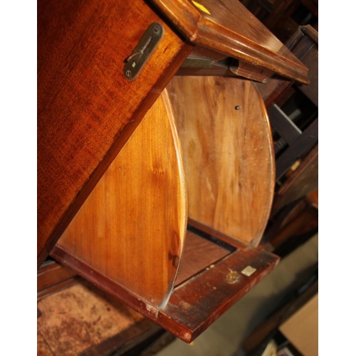 603 - An Edwardian mahogany and banded coal purdonium with raised back, on bracket supports, 15 1/4