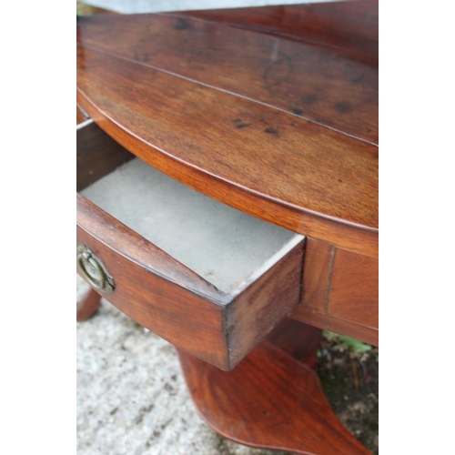 632 - A mahogany bowfront corner washstand, fitted one drawer and undertier, on splay supports, 24