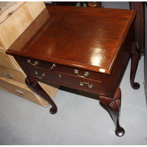 674 - A reproduction mahogany lowboy of Georgian design, fitted two drawers, on cabriole supports, 24