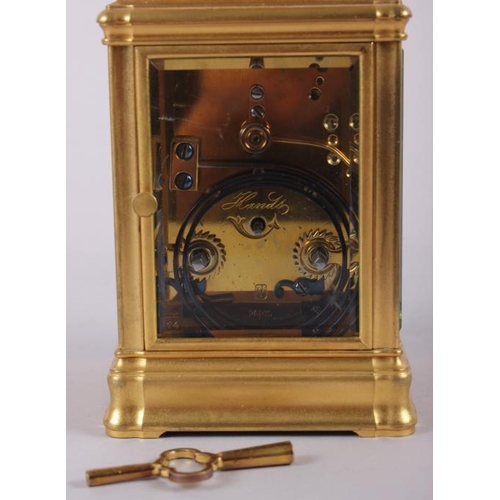 97 - A French hour repeat carriage clock, in gilt brass case, 5 3/4