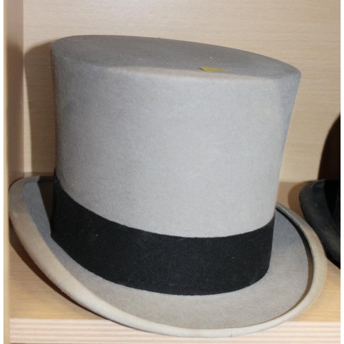 207 - A Lock & Co grey top hat, a black top hat and a Herbert Johnson black bowler hat