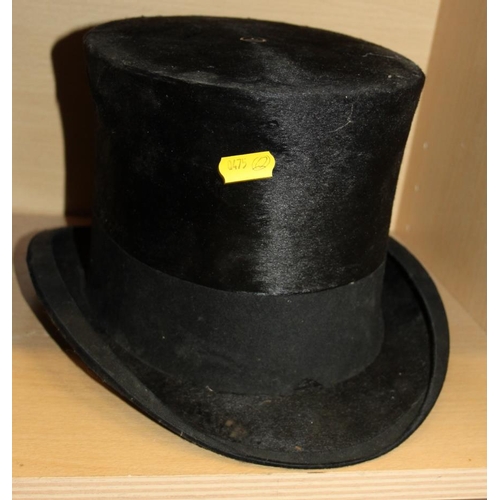 207 - A Lock & Co grey top hat, a black top hat and a Herbert Johnson black bowler hat