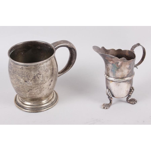 336 - A silver christening mug, 3.1oz troy approx, and a silver plated cream helmet