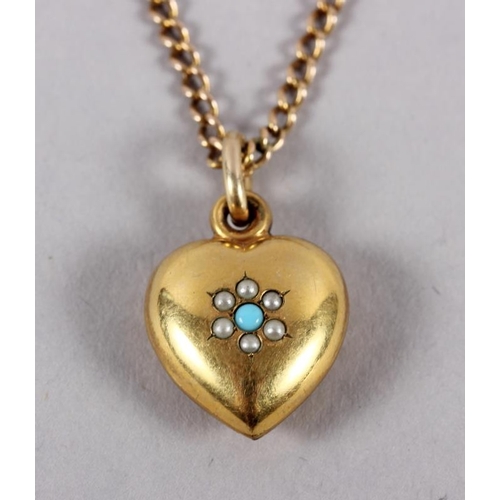 374 - A 19th century yellow metal heart-shaped pendent, set turquoise and seed pearls, on yellow metal cha... 