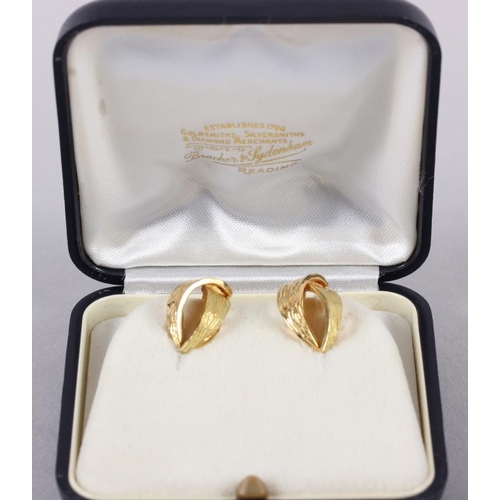 376 - A pair of 18ct gold ear clips with textured decoration, 7.3g gross