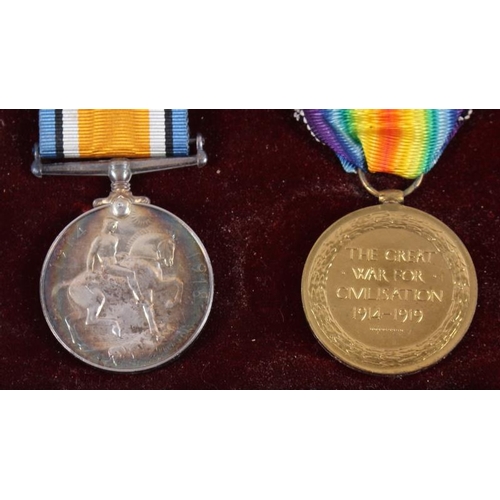 396 - A WWI British Service and Defence medal, in frame, and a death plaque