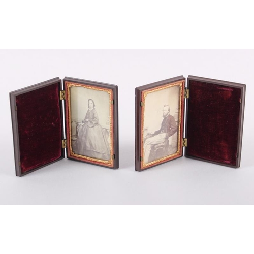 398 - A pair of mid 19th century photographic portraits of a man and woman, in union cases with gilt borde... 