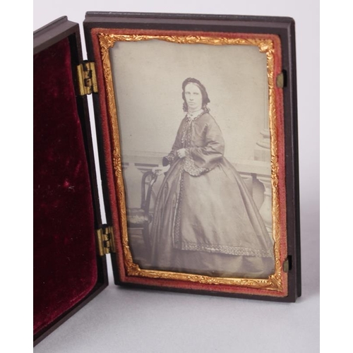 398 - A pair of mid 19th century photographic portraits of a man and woman, in union cases with gilt borde... 