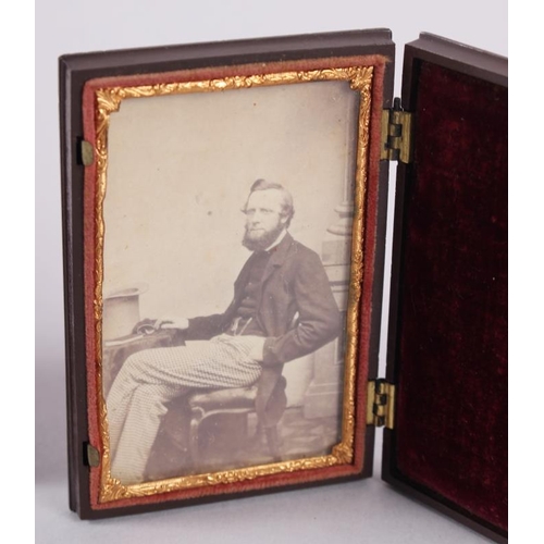 398 - A pair of mid 19th century photographic portraits of a man and woman, in union cases with gilt borde... 