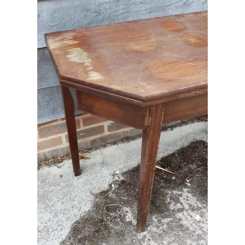 525 - A late Georgian padouk fold-over top tea table, on moulded square taper supports, 38