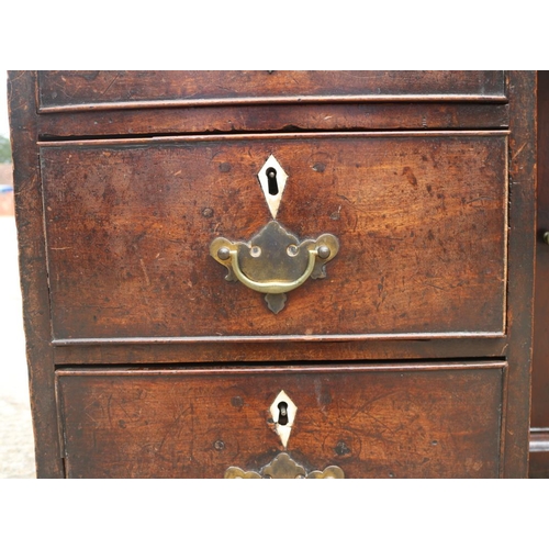 563 - A late 19th century mahogany double pedestal kneehole desk with tool lined top over nine drawers wit... 