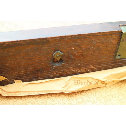 565 - A late 19th century mahogany sofa table, fitted two drawers and drop leaves, on splay supports, 39