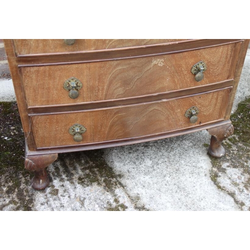 641 - A mahogany bowfront tallboy of eight drawers, on cabriole supports, 24