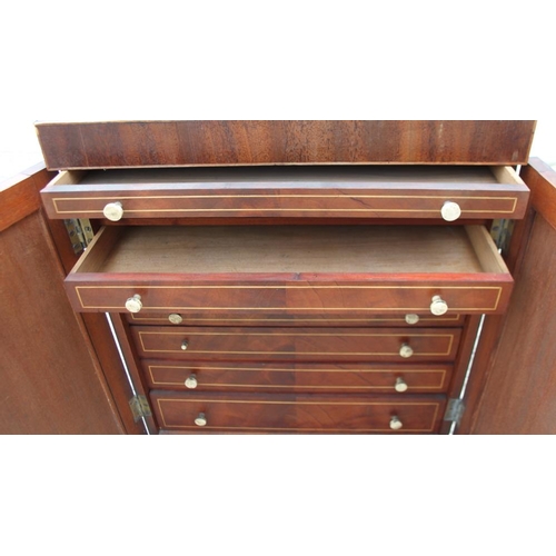 645 - A collector's Edwardian mahogany and line inlaid chest of eight graduated drawers enclosed two doors... 