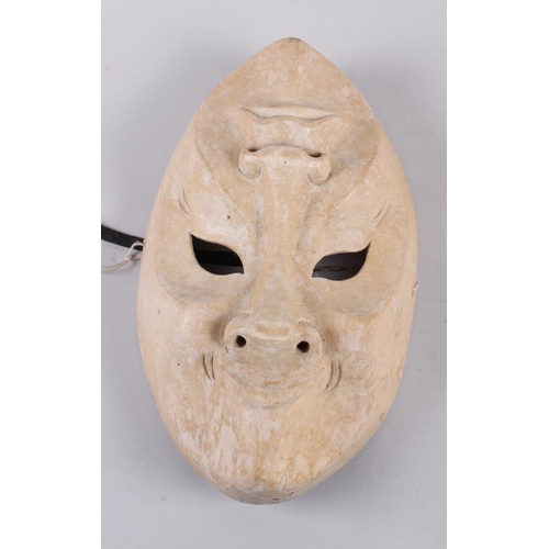 168 - A happy or sad wooden mask, 9