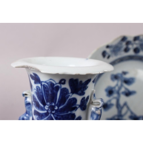 56 - An 18th century Chinese blue and white plate, decorated trees and flowers, an Imari bowl (heavily da... 