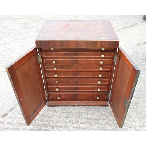 645 - A collector's Edwardian mahogany and line inlaid chest of eight graduated drawers enclosed two doors... 