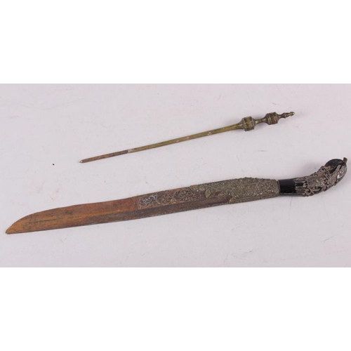 185 - An 18th century white metal mounted pia ketta and a coconut stylus, 10 1/2