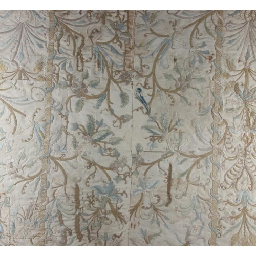 196 - A panel of 18th century? silk embroidered scroll and flower work, 26