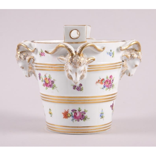 6 - A Dresden porcelain cache pot with ram's head handles and floral decoration, 5 1/2