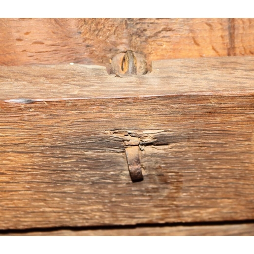 507 - An early 18th century chip carved coffer with triple panel lid, on moulded stile supports (retaining... 