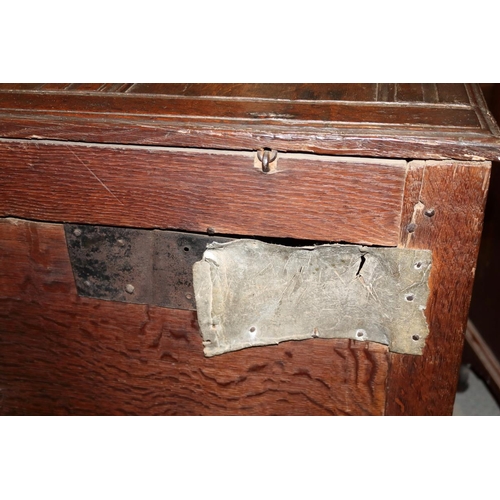 507 - An early 18th century chip carved coffer with triple panel lid, on moulded stile supports (retaining... 