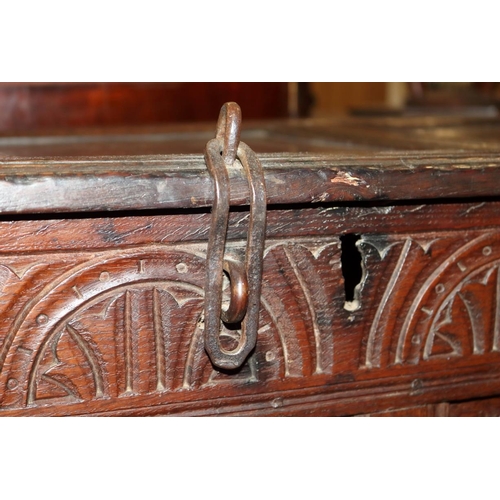 507 - An early 18th century chip carved coffer with triple panel lid, on moulded stile supports (retaining... 