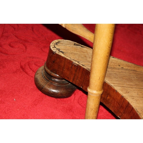 511 - A mid Victorian rosewood circular tilt top loo table, on square column and quadraform base, 48