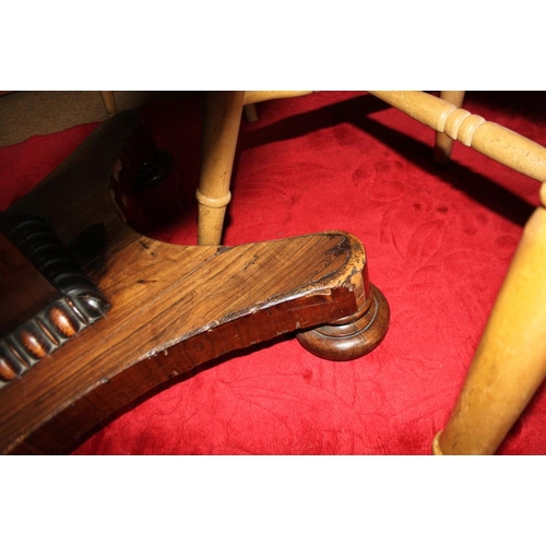 511 - A mid Victorian rosewood circular tilt top loo table, on square column and quadraform base, 48