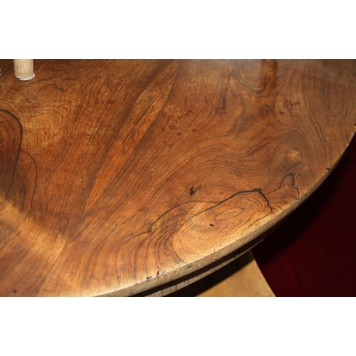 511 - A mid Victorian rosewood circular tilt top loo table, on square column and quadraform base, 48