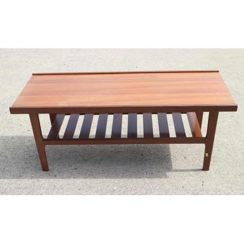 607 - A teak two-tier coffee table, 48