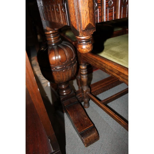 609 - An oak draw leaf extending dining table of 17th century design, on cup and cover turned supports, 10... 