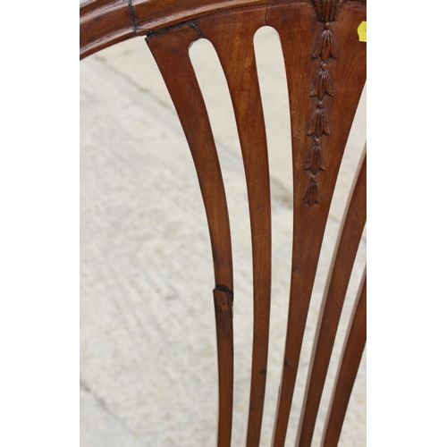 638 - Four George III design standard dining chairs with stuffed over seats, on square taper stretchered s... 