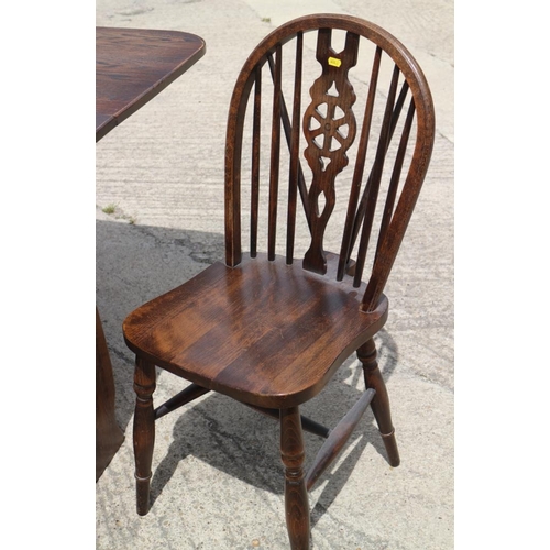 652 - An Edwardian carved frame cane seat and back settee and matching armchairs, an oak drop leaf dining ... 