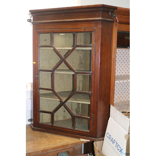 534 - A late Georgian mahogany corner display cabinet enclosed astragal glazed doors, 31