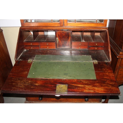 544 - A George III mahogany bureau bookcase, the upper section enclosed astragal glazed doors, over fitted... 