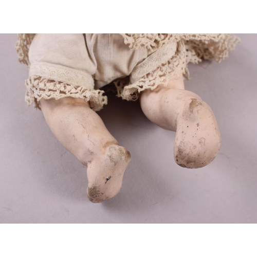 189 - An Armand Marseille porcelain head doll, stamped 341/2K, Germany A'M (damages)