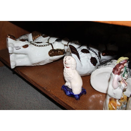 21 - Three pairs of Staffordshire dogs, a Taunton wash jug, bowl and basin, platters teacups, saucers and... 