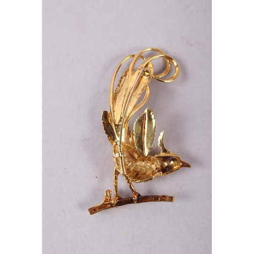 355 - An 18ct gold brooch, in the form of a bird