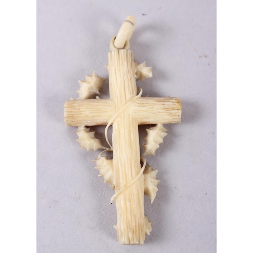 360 - A 19th century Dieppe carved ivory crucifix with holly leaves, 3