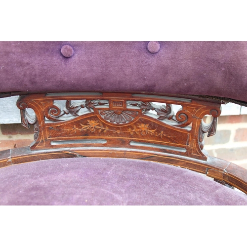 536 - A pair of late Victorian rosewood and line inlaid low seat armchairs, upholstered in a purple velour... 