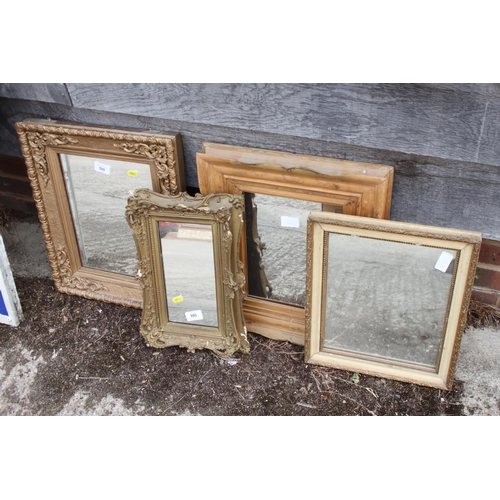 588 - A rectangular ornate gilt framed mirror, plate 12