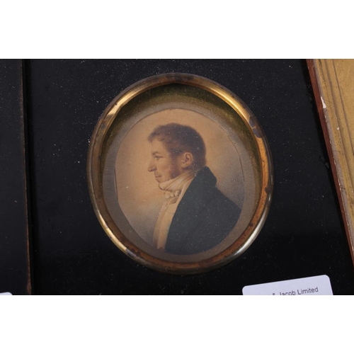 406 - A 19th century portrait miniature of a woman with auburn ringlets, in gilt frame and four other mini... 