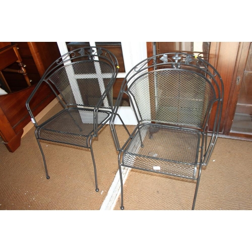 702 - A metalwork mesh table and a pair of matching armchairs, table 41