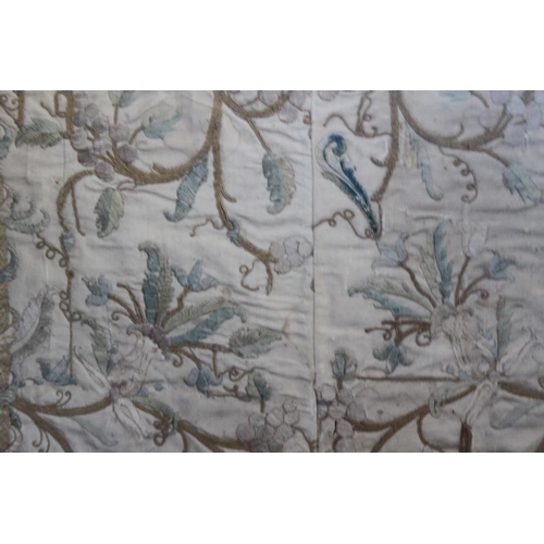 196 - A panel of 18th century? silk embroidered scroll and flower work, 26