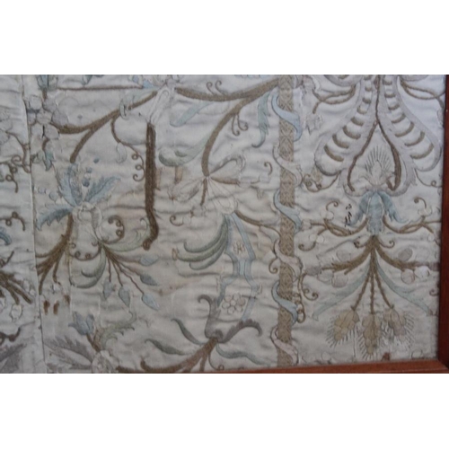 196 - A panel of 18th century? silk embroidered scroll and flower work, 26