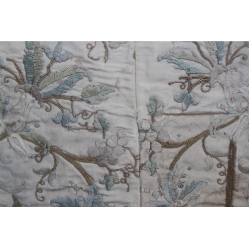 196 - A panel of 18th century? silk embroidered scroll and flower work, 26