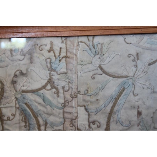 196 - A panel of 18th century? silk embroidered scroll and flower work, 26