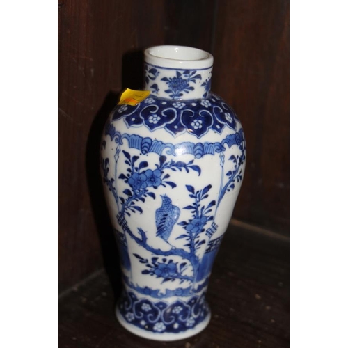 53 - A pair of 19th century Chinese blue and white vases, decorated panels with figures, birds and flora ... 